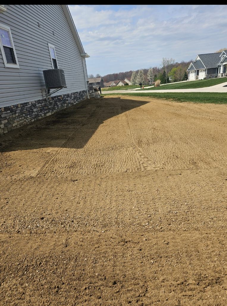 Recently graded yard by Fine Line Excavation